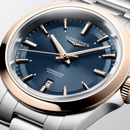 Longines Conquest 30mm Blue Automatic Stainless Steel Rose Gold PVD Finish L3.320.5.92.6