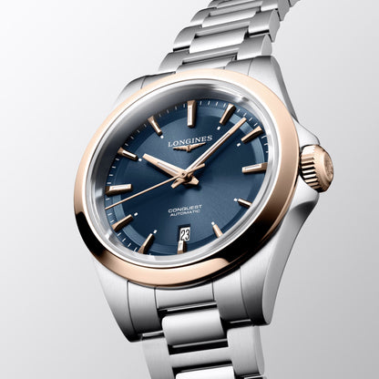 Longines Conquest 30mm Blue Automatic Stainless Steel Rose Gold PVD Finish L3.320.5.92.6